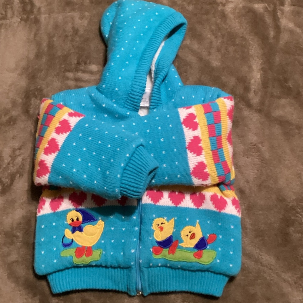 O’Rite Kids sweater with hood.